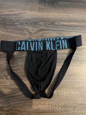 Calvin Klein Black Jockstrap with Blue Logo Waistband